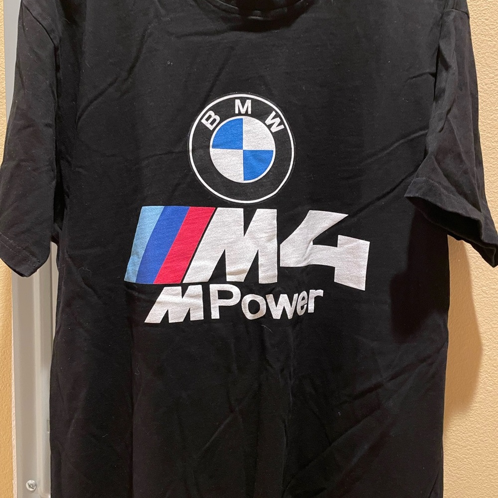 BMW T-shirts, hundred percent cotton, used, but like new.$25 for all 3